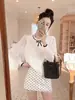 Top de punto con cuello de muñeca y retazos de gasa y seda de hielo para mujer, nuevo estilo Primavera y Otoño 2026, diseño holgado que reduce la edad, manga larga