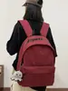 Nova Mochila Escolar Ensino Fundamental Médio Faculdade Bolsa de Ombro Dupla Mochila Casual de Grande Capacidade Transfronteiriça Duplo Ombro Feminina de Alto Padrão Nicho