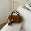 Bolso de hombro versátil para mujer, nuevo y moderno 2026, bolso de mano retro para otoño/invierno, bolso almohada, bolso bowling