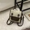 Bolsa Feminina Versátil Color-Blocking Outono e Inverno 2026 Nova Mochila Retrô Tendência com Toque de Luxo para Viagens e Passeios Mochila Pequena