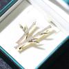 Broche de bambú con diseño de nicho de estilo chino, elegante broche de bambú de alta gama, accesorios de moda exquisitos.