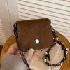 Bolso mini exquisito transfronterizo nuevo estilo personalizado moderno para niñas sobre rojo bolso de exterior bolso de hombro cruzado casual de moda