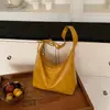 Bolso de axila retro transfronterizo tipo empanada, nuevo modelo de verano 2025, bolso popular este año, bolso versátil de hombro y cruzado de nicho