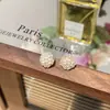 Pendientes de Botón Florales Estilo Chanel para Mujer 2025 Nuevos Pendientes Populares Pendientes de Diseño Único de Nicho Accesorios