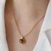 [El acero de titanio no se decolora] Collar de piedra de ojo de tigre ovalada con temperamento retro, cadena de clavícula de lujo de nicho senior Maillard