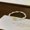 Pulseira de Contas Fresca e Limpa Estilo Francês com um Toque Lindo e Sofisticado, Design Moderno e Versátil para Mulheres
