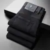 Roupas Masculinas Populares / Novo Outono e Inverno Luxo Negócios Estilo Europeu Slim Fit Stretch Calça Jeans Reta Tendência Marca Calças Grossas