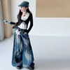 Conjunto de Primavera y Otoño para Niñas 2026 Nuevo Casual Falso Dos Piezas Capa Base con Borde Deshilachado Letra Pantalones de Pierna Ancha Conjunto Moderno