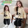 Conjunto de Ropa para Niñas Primavera y Otoño 2026 Nuevo Conjunto de Moda Estilo Coreano para Niñas Pequeñas, Pantalones de Lunares con Gato Negro, Elegante Conjunto de Dos Piezas