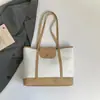 Bolsa Casual Grande Capacidade para Mulheres 2026 Primavera e Verão Novo Estilo Versátil Cor Contrastante Bolsa Tote Simples para o Dia a Dia Bolsa de Ombro Cor Contrastante