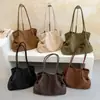 Bolsa Casual de Tecido Texturizada para Ombro Feminina Verão 2026 Nova Simples Elegante Bolsa de Mão Moda Bolsa de Ombro Único