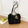 Bolso tote diario de color liso transfronterizo, bolso de gran capacidad de moda para mujer, nuevo estilo Otoño 2026, bolso de hombro único a la moda para ir al trabajo