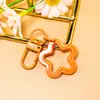 Llavero Creativo de Estrella de Cinco Puntas Hueca de Colores Hebilla de Puerta Giratoria Colgante Decorativo Creativo para Bolso Accesorios Hechos a Mano DIY