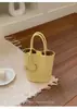 Bolsa de mão minimalista e moderna transfronteiriça para mulheres, nova bolsa de ombro tipo balde elegante e da moda, bolsa tiracolo versátil