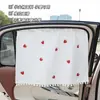 Parasol para coche con diseño de cerezas, diseño creativo con cordón y protección solar para niños.