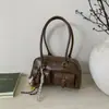 Bolsa de Ombro Casual da Moda para Mulheres 2025 Outono e Inverno Nova Tendência Versátil com Múltiplos Bolsos e Acabamento de Alto Padrão Bolsa de Mão