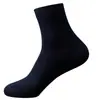 Calcetines para hombre 100% algodón cuatro estaciones absorbentes de sudor pies sin olor calcetines de tubo medio calcetines de algodón para hombre color liso versátiles calcetines de negocios