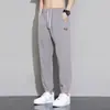 Pantalones de verano de seda helada para hombre al por mayor, pantalones casuales rectos holgados con cordón para hombre, adecuados para trabajar en obras de construcción, pantalones jogger finos