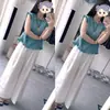 Conjunto Fresco y Elegante de Verano 2026 Estilo Francés Cuello Redondo: Elegante Diseño, Rejuvenecedor, Versátil Top de Manga Corta para Mujer y Pantalones de Pierna Ancha
