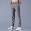 Calça Casual Masculina de Seda Gelada Fina Respirável Estilo Coreano Tendência de Verão 2024 Cintura Elástica Versátil Versão Slim Calça Casual