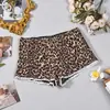 60633 Moda Femenina Transfronteriza Europea y Americana Nuevo Estampado de Leopardo Elásticos Pantalones Cortos Ajustados Encaje Bloques de Color Patchwork Pantalones Cortos Pequeños Mujer