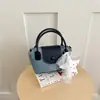 Bolso Pequeño Cuadrado de Mano Estilo Fresco y Dulce para Mujer 2026 Bolso de Hombro Individual de Bloques de Color Patchwork Moda Nueva Bolso Cruzado de Moda