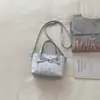 Bolsa de Balde de Mão com Estampa de Nicho Super Quente para Mulheres 2026 Nova Mini Bolsa Transversal Versátil Exquisita Bolsa Pequena de Mão para Sair