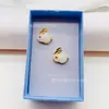 Pendientes de Conejo Imitación Chapados en Oro de Latón Estilo Nuevo Chino de Lujo Ligero Exquisitos Pequeños Pendientes Tridimensionales Venta al por Mayor