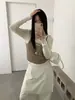 Camiseta de punto de manga larga bicolor de dos piezas falsas para mujer, nuevo estilo coreano de otoño e invierno 2026, top casual y relajado para mujer