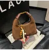 Bolsa Retro de Alta Gama Popular para Mujer de Este Año 2025 Nuevo Diseño de Nicho Bandolera Hombro Cruzado Bolso para Viajar Estilo Dumpling