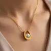 Collar minimalista de moda transfronterizo, cara sonriente chapada en oro, versátil para el uso diario y como regalo, con un pequeño colgante de ladrillo de oro en forma de lágrima