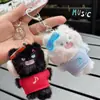Nuevos Auriculares Bluetooth Serie Mascota Esponjosa Llavero de Muñeca de Peluche Colgante Creativo para Mochila de Pareja