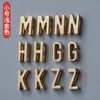 Aleación de Zinc Zhenming 26 Letras Inglesas Accesorios Cortados con Letras Equipaje Ropa Pulsera Ferretería Botones Personalización