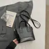 Bolso pequeño súper popular para el trabajo, bolso de hombro tejido para mujer nuevo de verano 2026, bolso cruzado tipo cubo para ir al trabajo