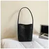 Bolso de Hombro Único de Alta Apariencia para Mujer Verano 2026 Nuevo Bolso de Mano de Nicho Bolso Cubo Hueco Elegante Bolso de Hombro a la Moda