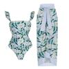 [Traje de baño tipo suit para vacaciones en aguas termales para mujer] Traje de baño de playa con falda de gasa de gasa cruzada europea y americana Amazon