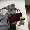 Bolso pequeño cuadrado de nicho coreano transfronterizo 2026 verano nuevo moda retro bolso de mano versátil bolso de hombro cruzado