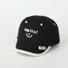 Boné de Baseball Infantil de Aba Curta Ins Moda Japonesa e Coreana Bordado Olá Sorridente Boné Infantil Chapéu Infantil da Moda Venda por Atacado