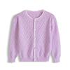 Versión coreana de camisa de aire acondicionado con protector solar para niños pequeños y medianos, cárdigan de punto con lazo hueco de primavera y otoño para niñas, venta al por mayor fina de verano