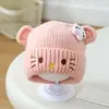 Sombrero para niños, sombrero de lana engrosado con diseño de gato KT de dibujos animados para niñas, de 3 a 8 años, sombrero de punto para niños de mediana edad, sombrero con protección para las orejas de otoño e invierno