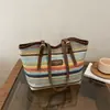 Bolsa de palha listrada grande capacidade 2026 primavera novo estilo moderna fashion trançada versátil simples de ombro único sacola de praia