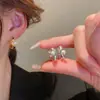 Hebilla de Oreja Circular Ola Perla Única Diseño de Nicho Pendientes de Alta Gama Pendientes Circulares de Perla Simples y de Moda para Mujer
