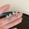 Pendientes de piedra blanca con lazo brillante para mujer, estilo ins, diseño de nicho, pendientes de alta gama, moda elegante, pendientes de celebridades de Internet.