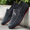 Zapatos de hombre de Beijing zapatos de tela de tendón de res nuevos zapatos casuales transpirables zapatos de trabajo resistentes al desgaste antideslizantes lona