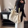 Bolso de Mujer Estilo Casual de Nicho de Gama Alta Verano 2026 Nuevo Versión Coreana Bolso de Lona Bolso Tote de Gran Capacidad Bolso de Hombro para Viajar