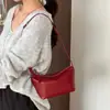 Bolsa tipo caixa macia de couro bovino de camada superior 2026 nova nicho retrô transversal bolsa de bolinho couro genuíno ombro axila bolsa almofada