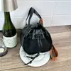 Bolsa esmerilada transfronteriza para mujer, nueva bolsa cruzada versátil con cordón, moda retro, bloques de color, correa ancha, bolso tipo cubo para debajo del brazo