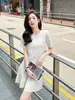 Elegante Conjunto de Dos Piezas de Punto de Seda Helada Estilo Chanel, Top de Cuello Redondo y Falda, Conjunto Casual de Moda