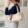 Bolso versátil vintage para mujer 2026 nuevo bolso de hombro para axilas de otoño gran capacidad bolso tote de alta gama bandolera