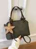 Bolso de mano retro transfronterizo para mujer, nuevo bolso de hombro simple de moda 2026, bolso cruzado versátil de nicho para el día a día